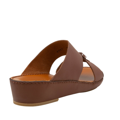 Brown comfortable designer slides with a cushioned footbed and leather upper from Private Collection