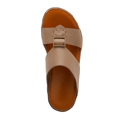 Beige Private Collection comfortable designer slides with crisscross straps and cushioned brown footbed