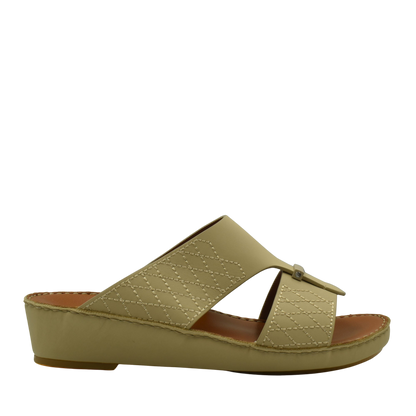 Beige designer leather sandals with quilted stitching and open toe on wedge sole