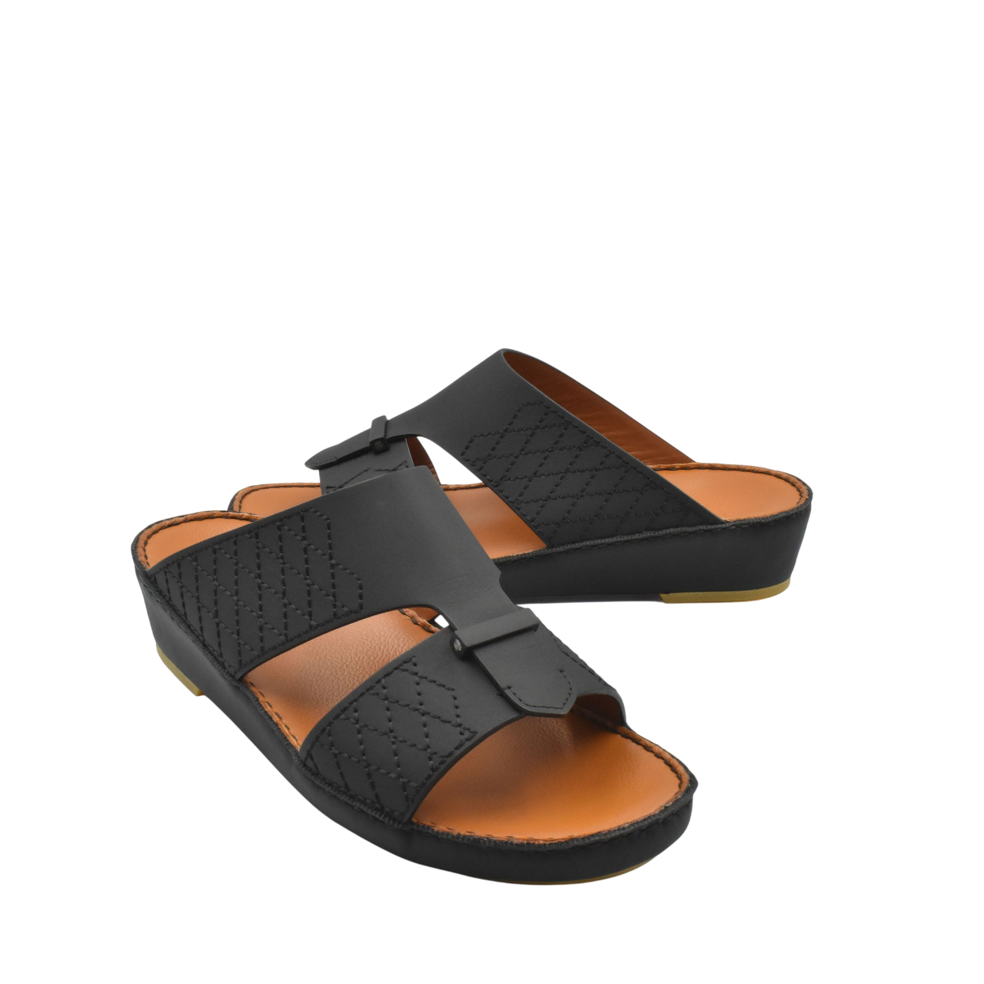 Black designer leather sandals with quilted straps and cushioned tan footbed for comfort
