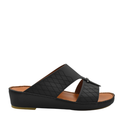 Black designer leather sandals with quilted straps and cushioned sole from Private Collection
