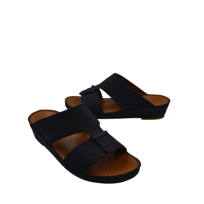 Black designer leather sandals with wide straps and cushioned brown footbed from Private Collection