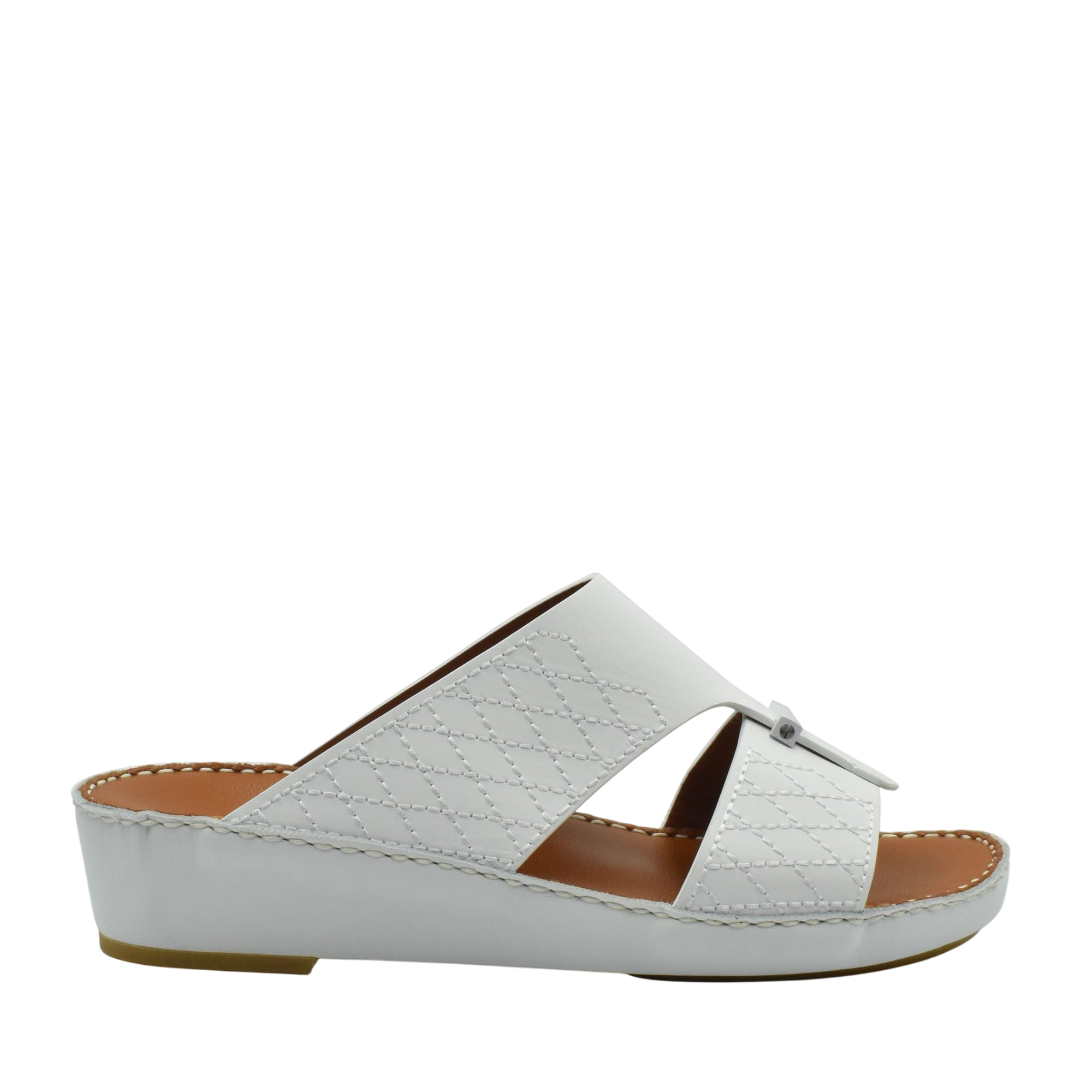 White designer leather sandals with quilted pattern and low wedge sole from Private collection