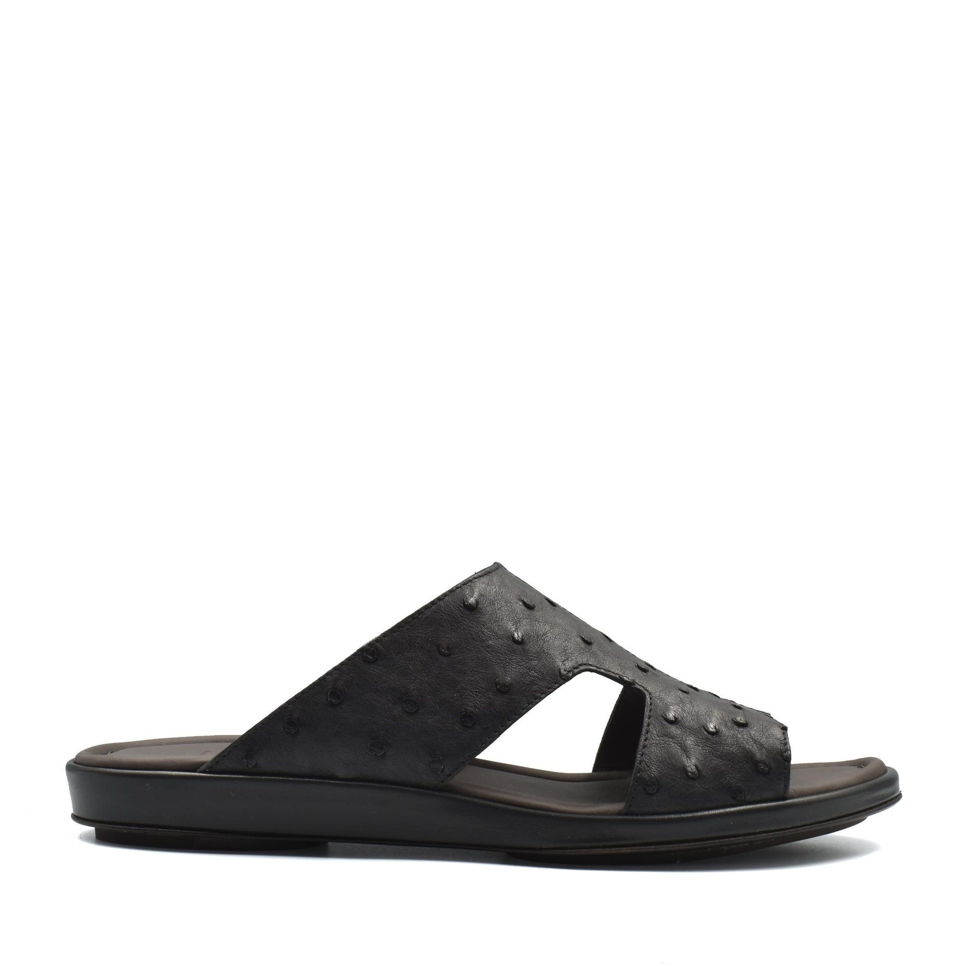 Black ostrich skin slide sandals with textured upper and comfortable sole from Private collection
