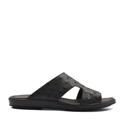 Black ostrich skin slide sandals with textured upper and comfortable sole from Private collection