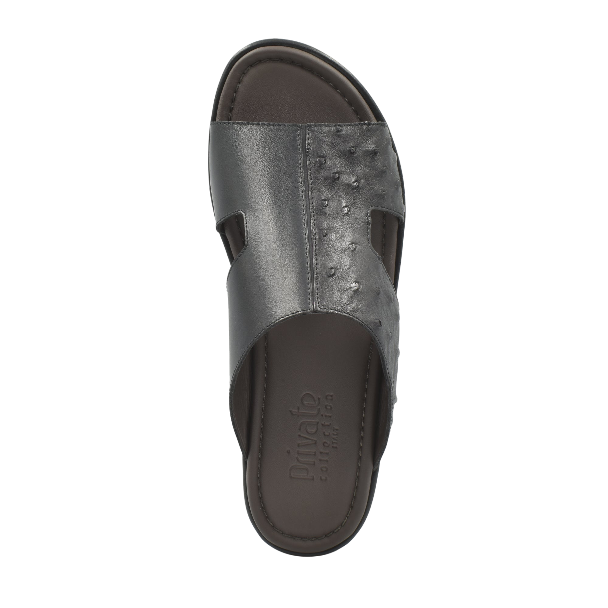 Black ostrich skin slide sandals from Private Collection with textured upper and open toe design