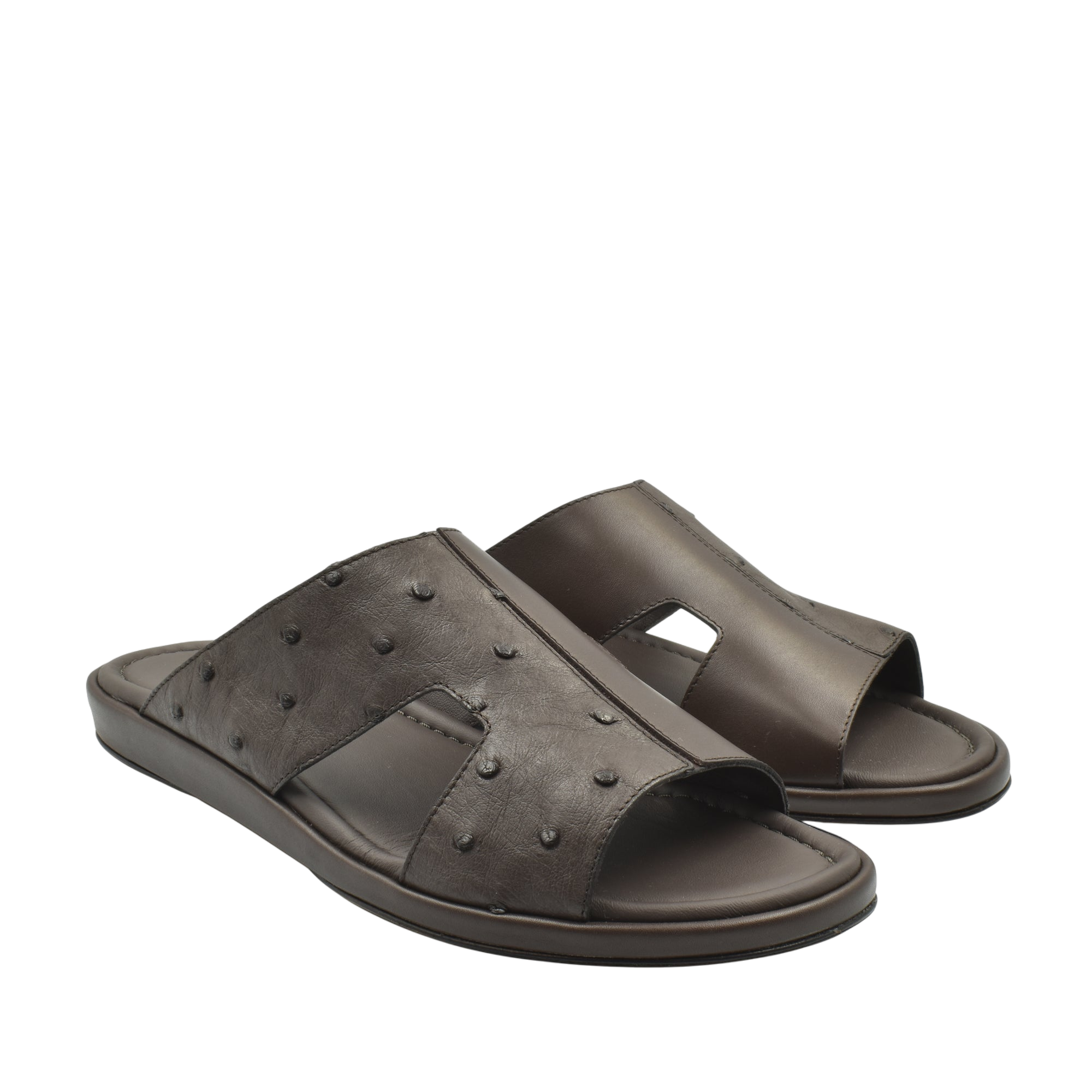Brown ostrich skin slide sandals with textured leather and open toe design for comfortable wear