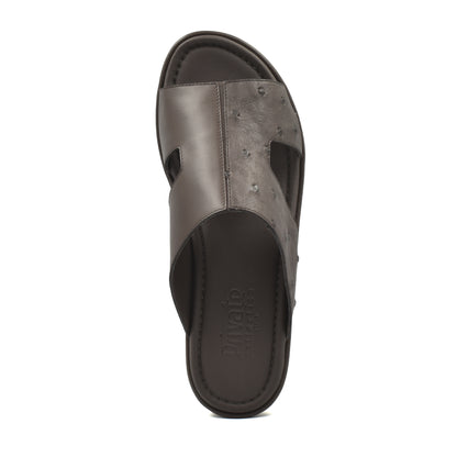 Top view of brown ostrich skin slide sandals with cushioned footbed from Private Collection