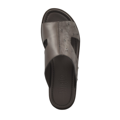 Top view of brown ostrich skin slide sandals with cushioned footbed from Private Collection