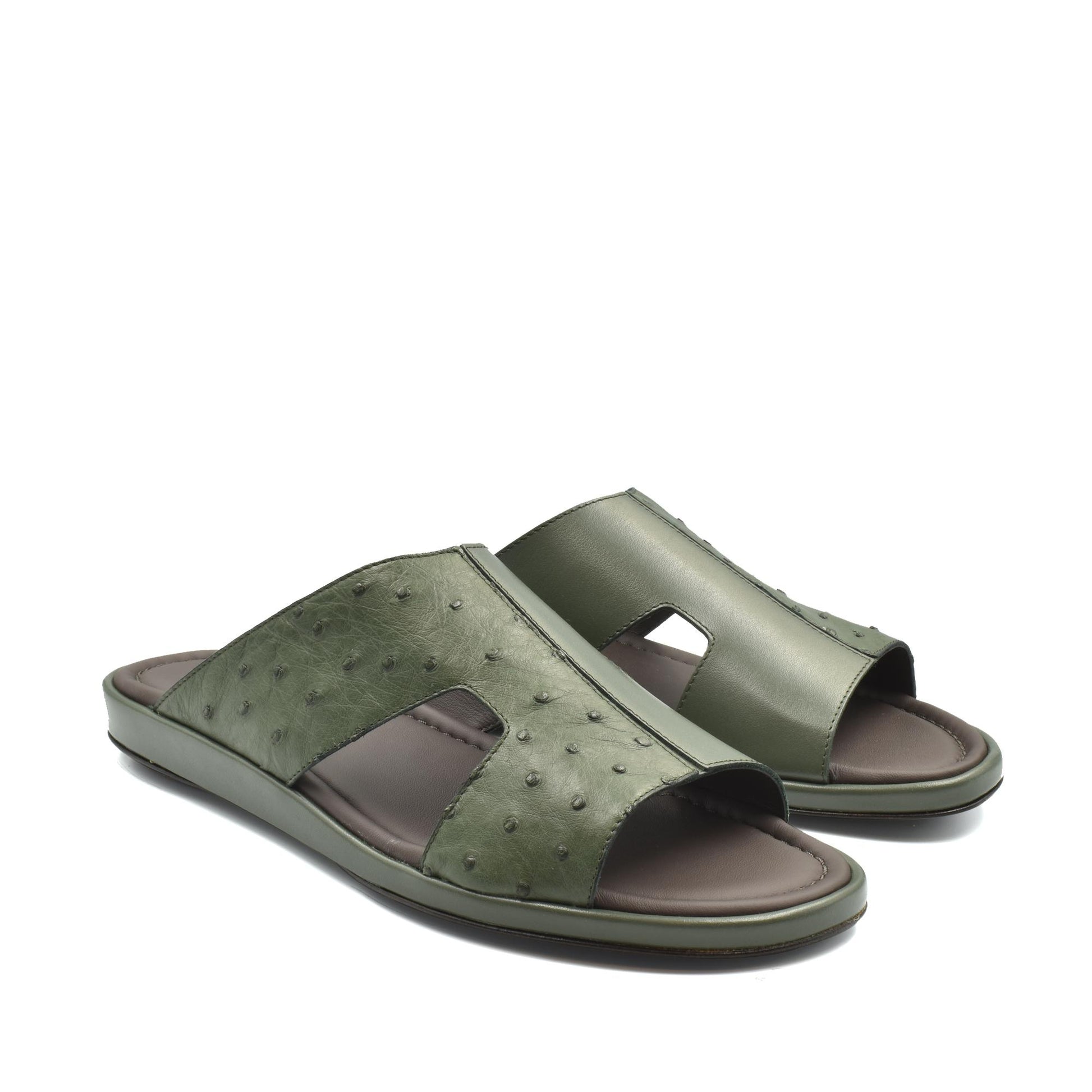 Green ostrich skin slide sandals with open toe and comfortable cushioned sole