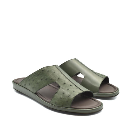 Green ostrich skin slide sandals with open toe and comfortable cushioned sole