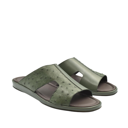 Green ostrich skin slide sandals with open toe and comfortable cushioned sole
