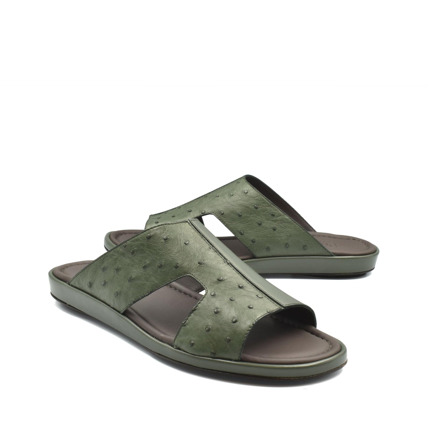 Green ostrich skin slide sandals with open toe and cushioned sole for comfortable wear