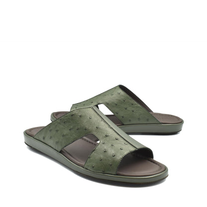 Green ostrich skin slide sandals with open toe and cushioned sole for comfortable wear