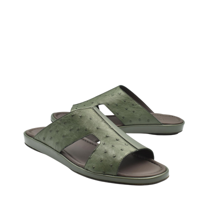 Green ostrich skin slide sandals with open toe and cushioned sole for comfortable wear