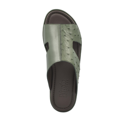 Olive green ostrich skin slide sandals with textured leather upper and cushioned footbed