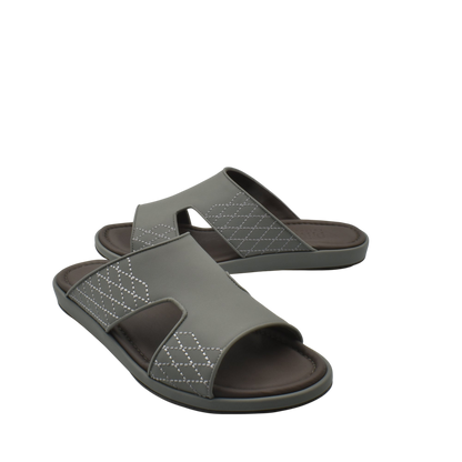 Gray slip-on luxury arca sandals with quilted stitching and comfortable footbed for casual wear
