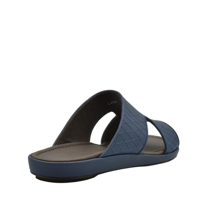 Blue luxury arca sandals with quilted straps and cushioned sole from private collection