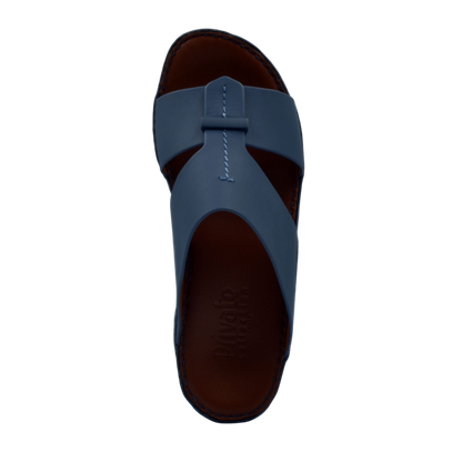 Blue leather luxury comfort sandals with cushioned brown footbed from Private Collection