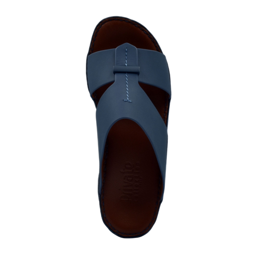 Blue leather luxury comfort sandals with cushioned brown footbed from Private Collection
