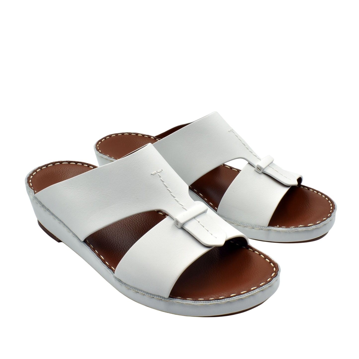 White leather luxury comfort sandals with cushioned brown footbed and slip-on design