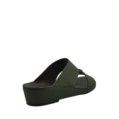 Green wedge sandal from Private Collection featuring Esagono Gomato shoes design with open toe