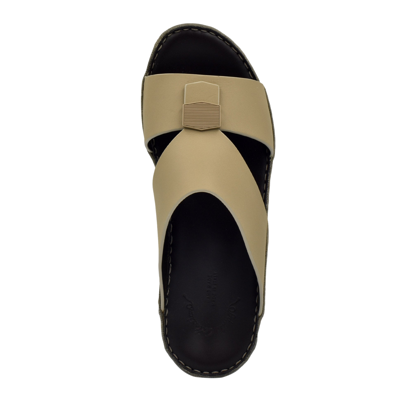 Top view of beige Esagono Gomato shoes with black sole and unique cross strap design
