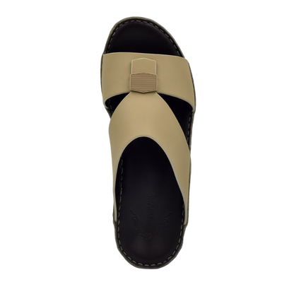 Top view of beige Esagono Gomato shoes with black sole and unique cross strap design