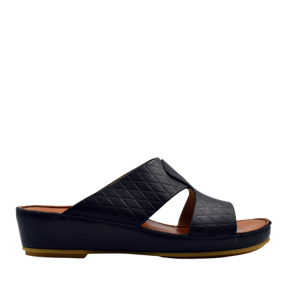 Black handcrafted Italian sandals with quilted leather straps and comfortable wedge sole