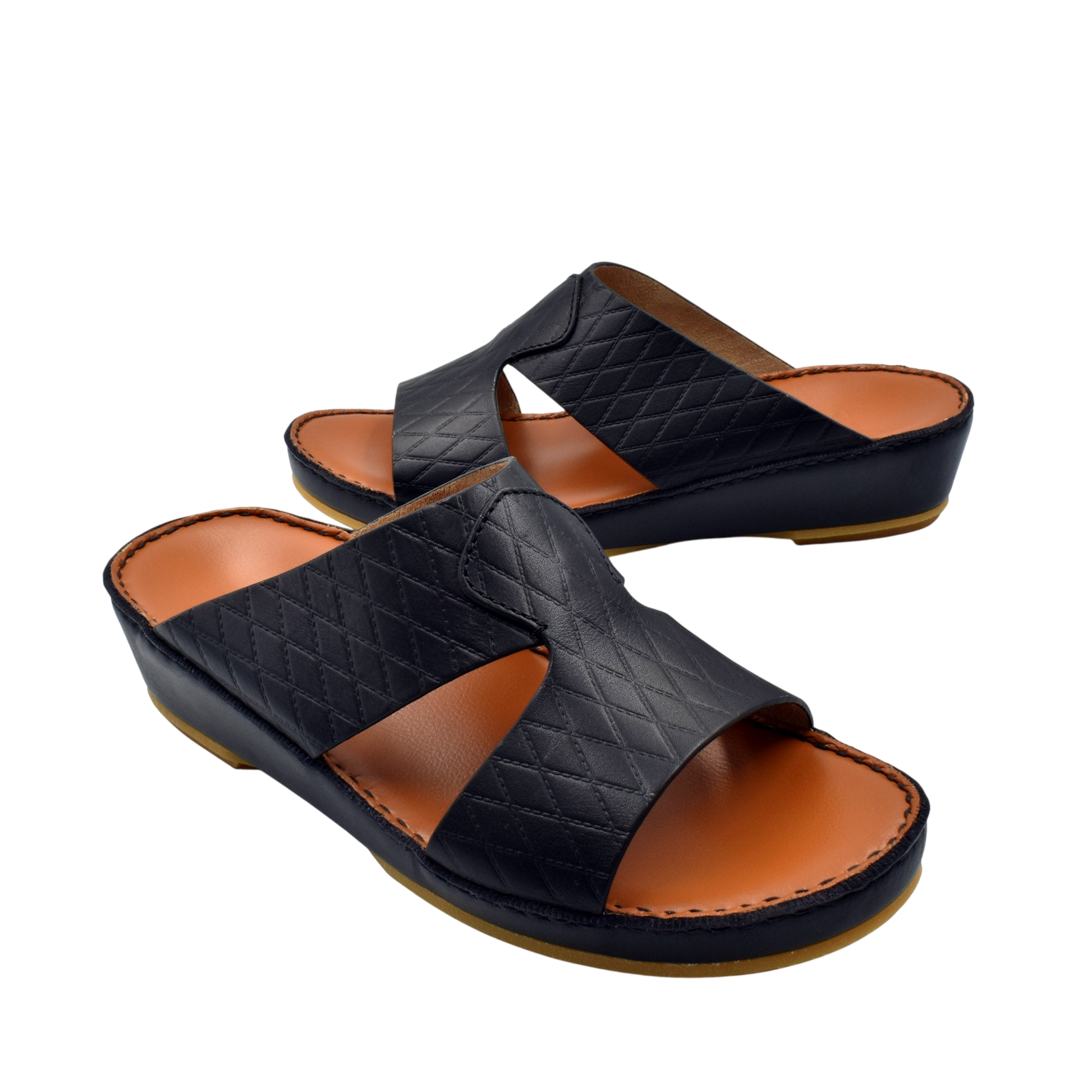Black handcrafted Italian sandals with quilted leather straps and cushioned tan footbed by Private Collection