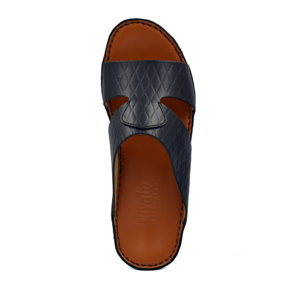 Handcrafted Italian sandals in black leather with quilted pattern and brown cushioned footbed