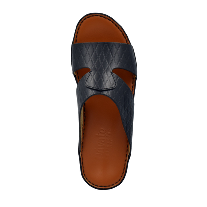 Handcrafted Italian sandals in black leather with quilted pattern and brown cushioned footbed