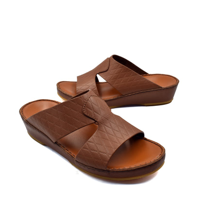 Brown handcrafted Italian sandals with quilted leather straps and cushioned footbed by Private Collection