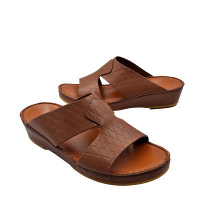 Brown handcrafted Italian sandals with quilted leather straps and cushioned footbed by Private Collection