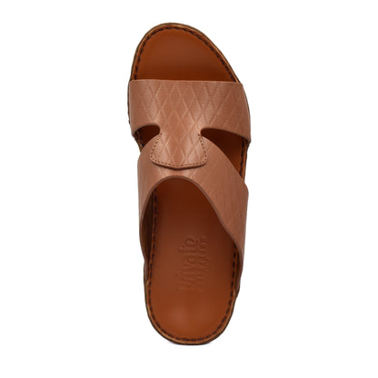 Top view of a brown handcrafted Italian sandals with textured leather straps and stitched sole