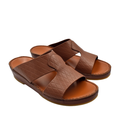 Brown handcrafted Italian sandals with quilted leather straps and cushioned soles by Private Collection