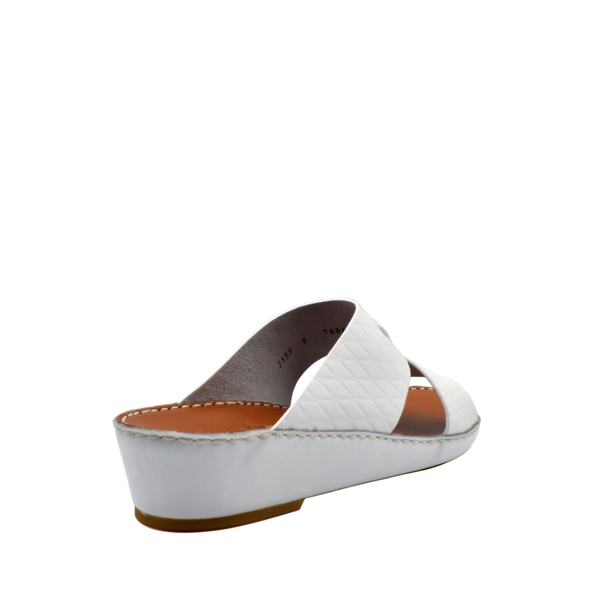White handcrafted Italian sandals with quilted straps and low wedge heel from Private Collection