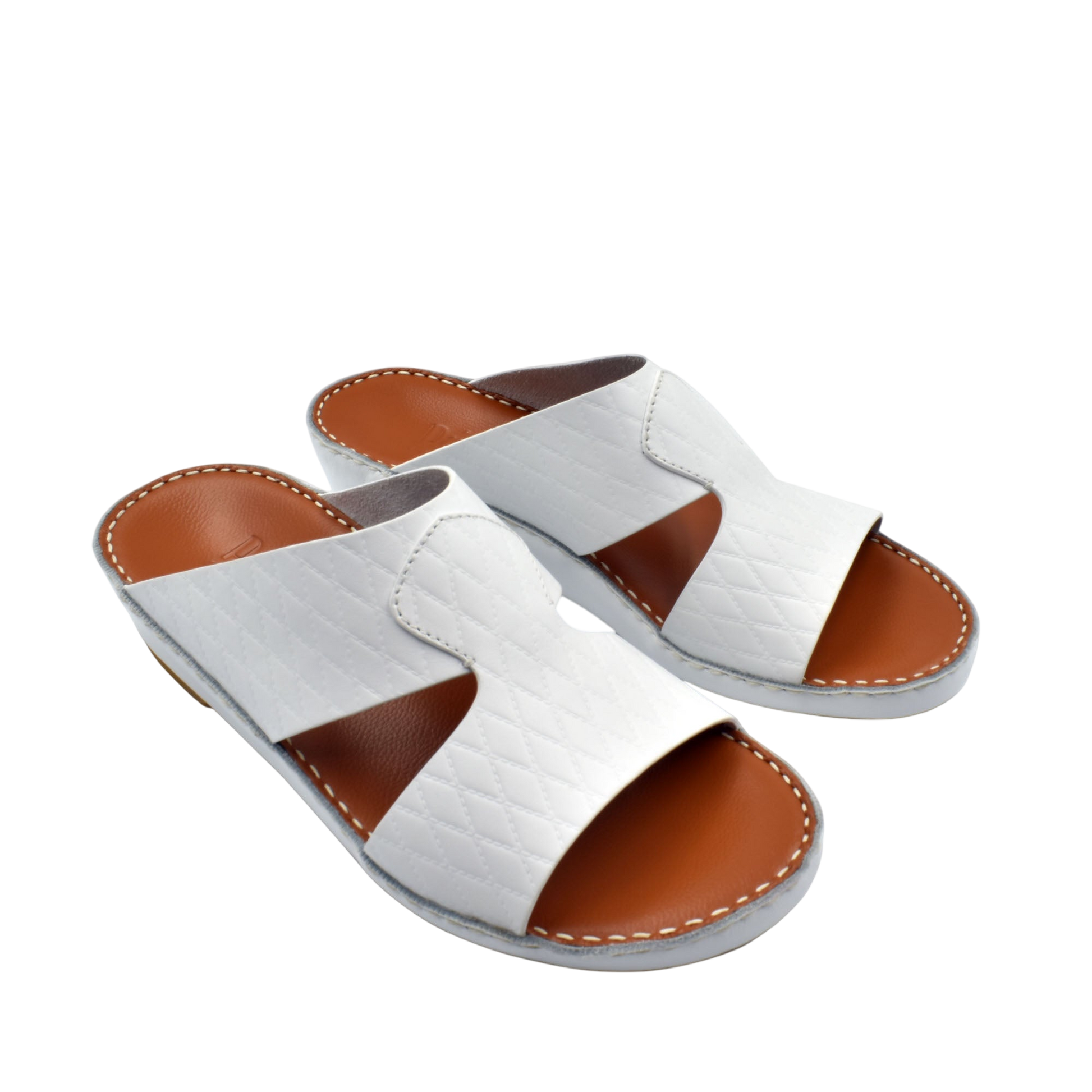 White handcrafted Italian sandals with brown footbed and stitched detailing from Private Collection