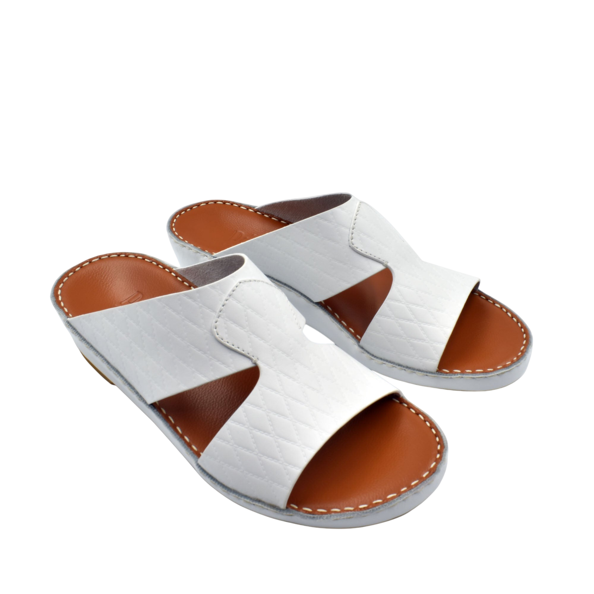 White handcrafted Italian sandals with brown footbed and stitched detailing from Private Collection