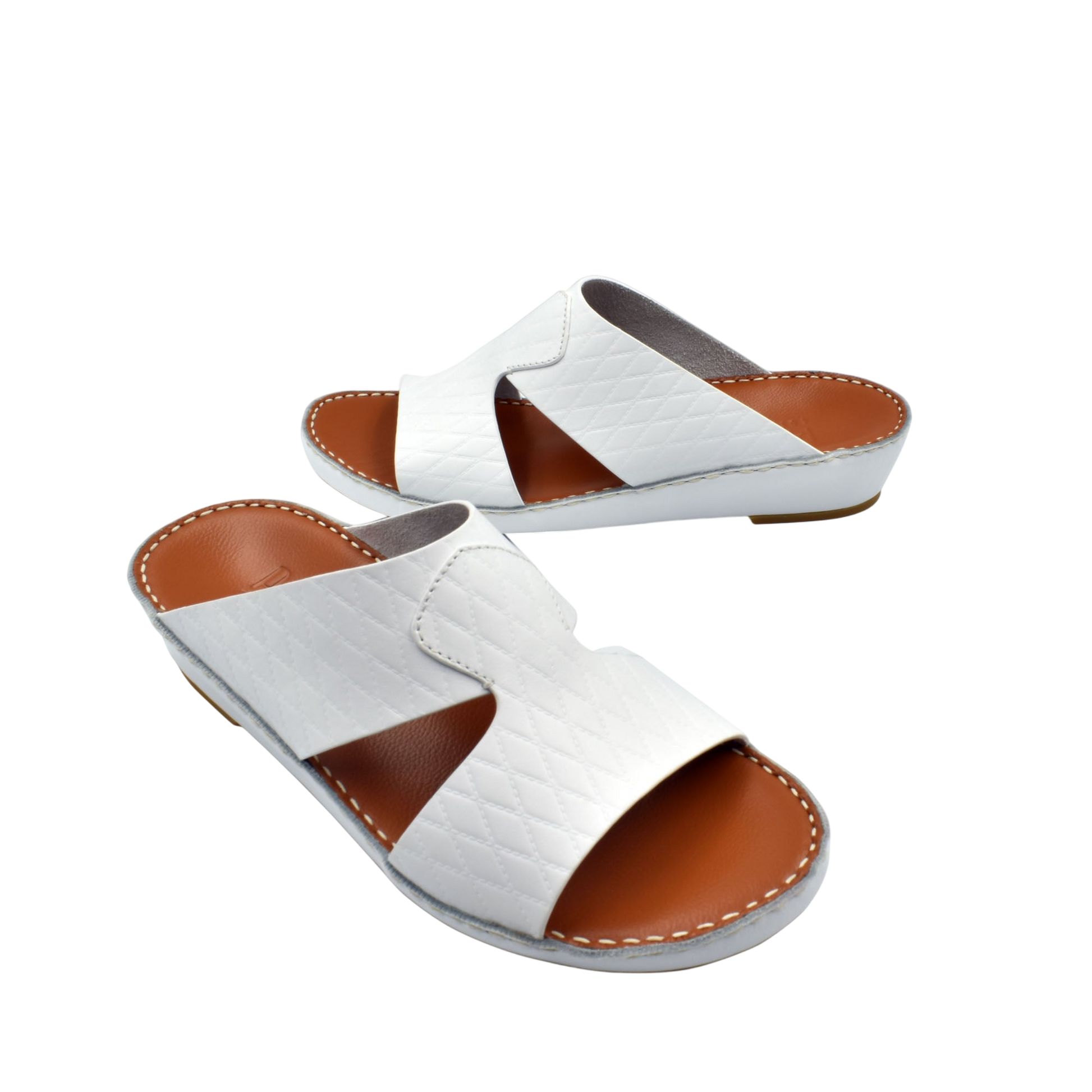 White handcrafted Italian sandals with brown cushioned sole and stitched details from Private Collection