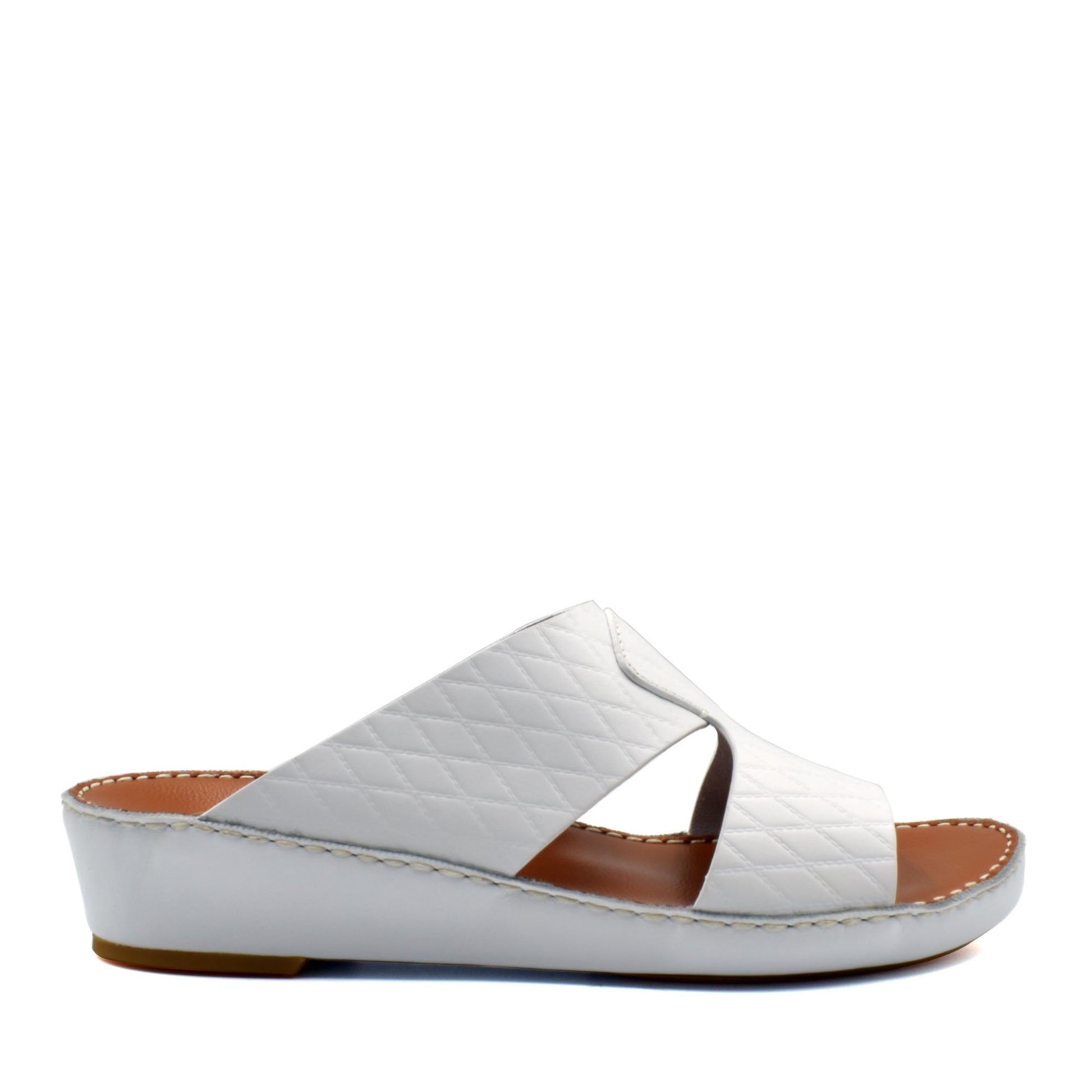White handcrafted Italian sandals with quilted leather upper and cushioned sole from Private Collection