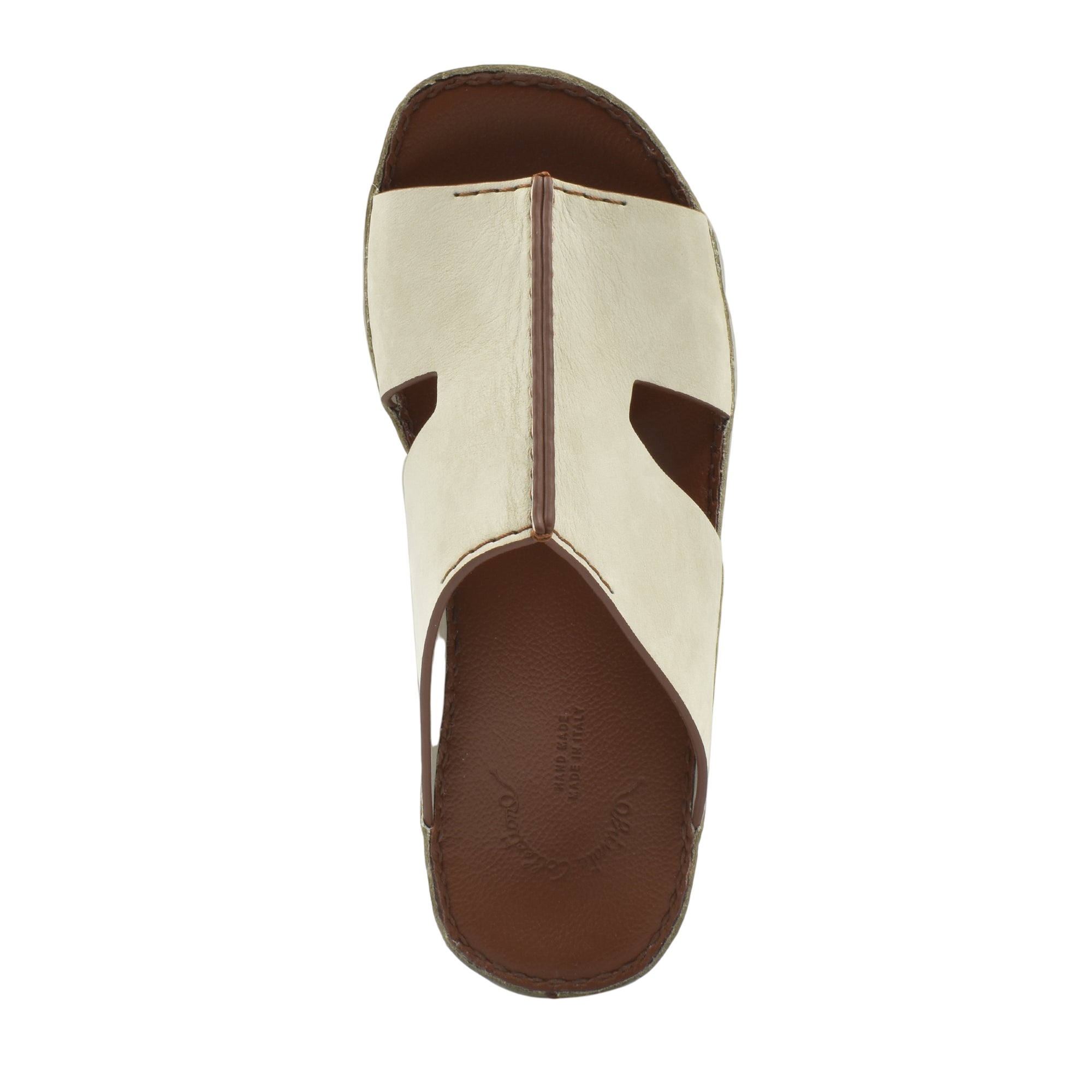 Top view of handcrafted leather shoes in white and brown with open toe design