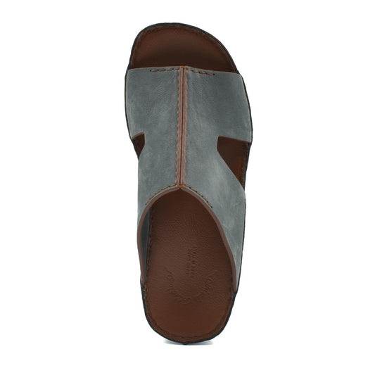 Top view of handcrafted leather shoes in brown and gray with open toe design