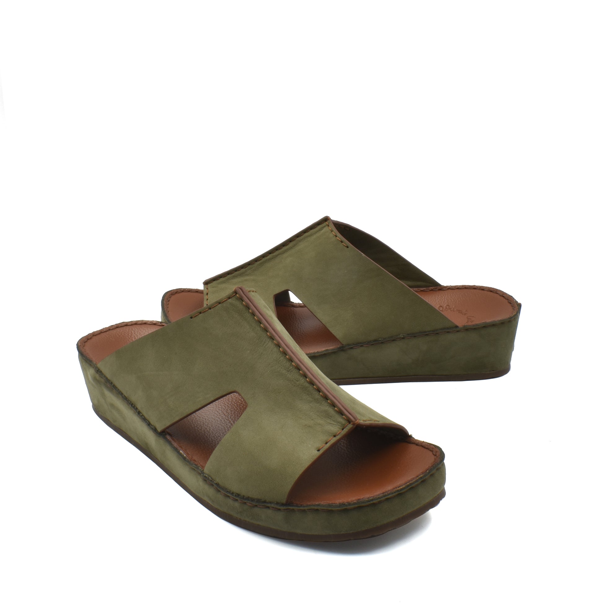 Green handcrafted leather shoes with open toe and cushioned sole from private collection