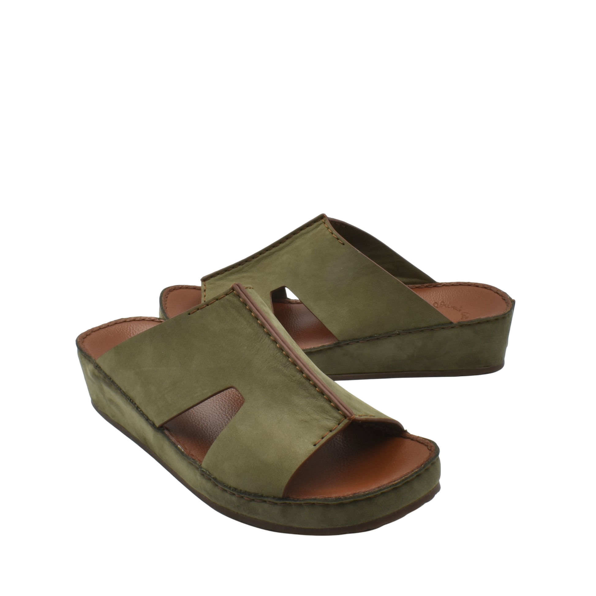 Green handcrafted leather shoes with open toe and cushioned sole from private collection