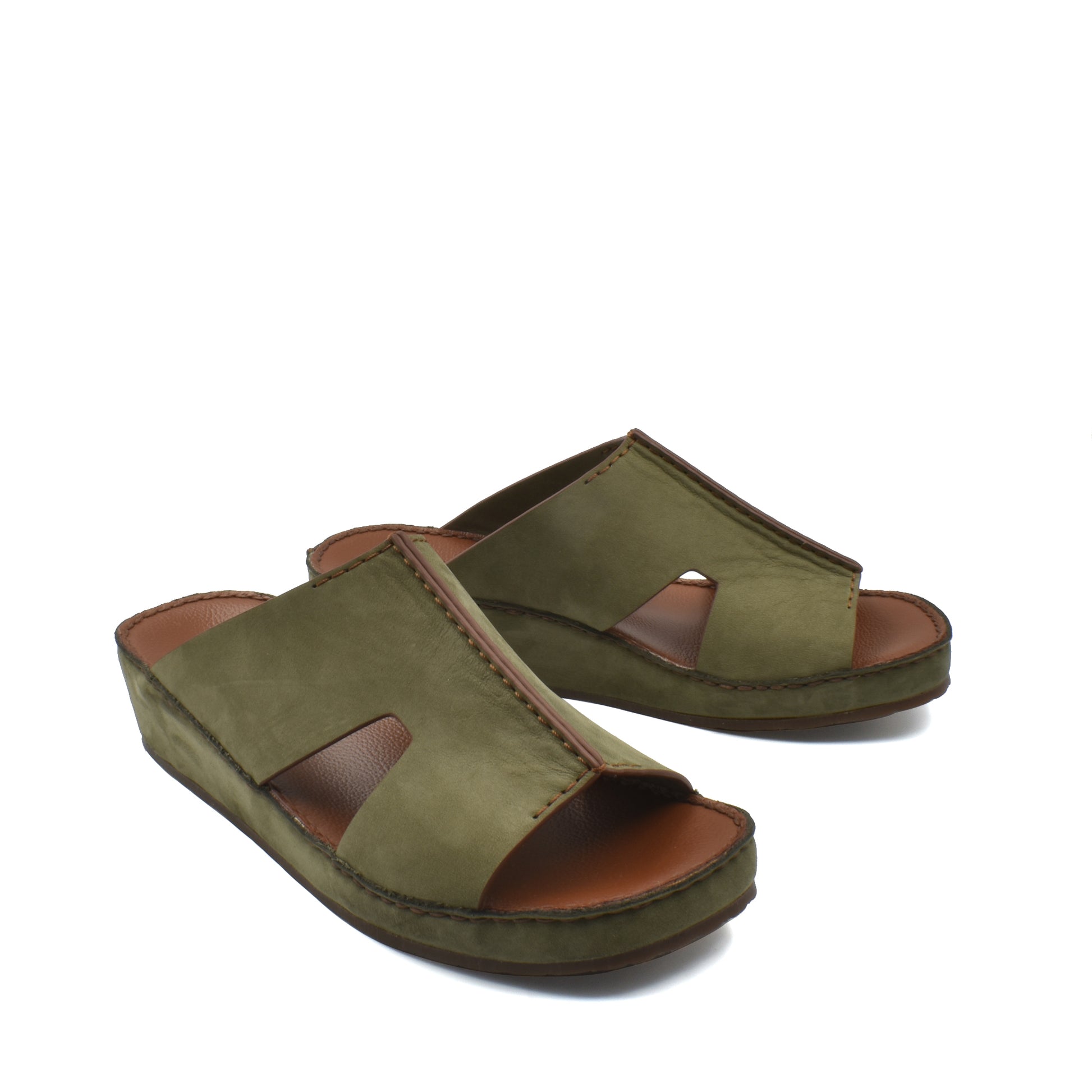 Green open-toe handcrafted leather shoes with a comfortable cushioned sole from Private collection