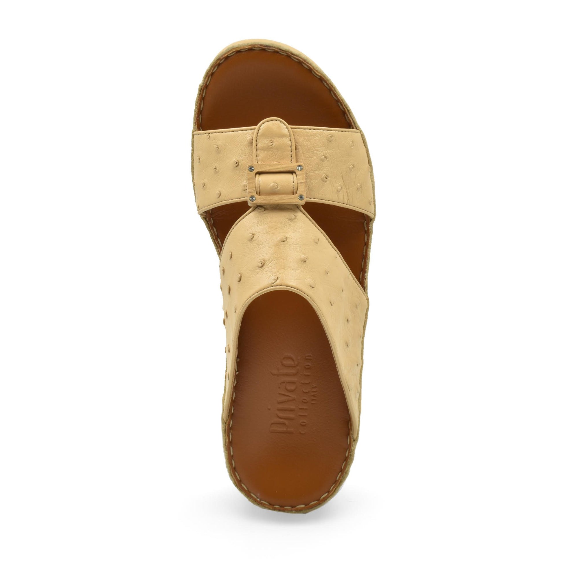 Top view of handcrafted olive sandals with beige textured straps and brown cushioned sole