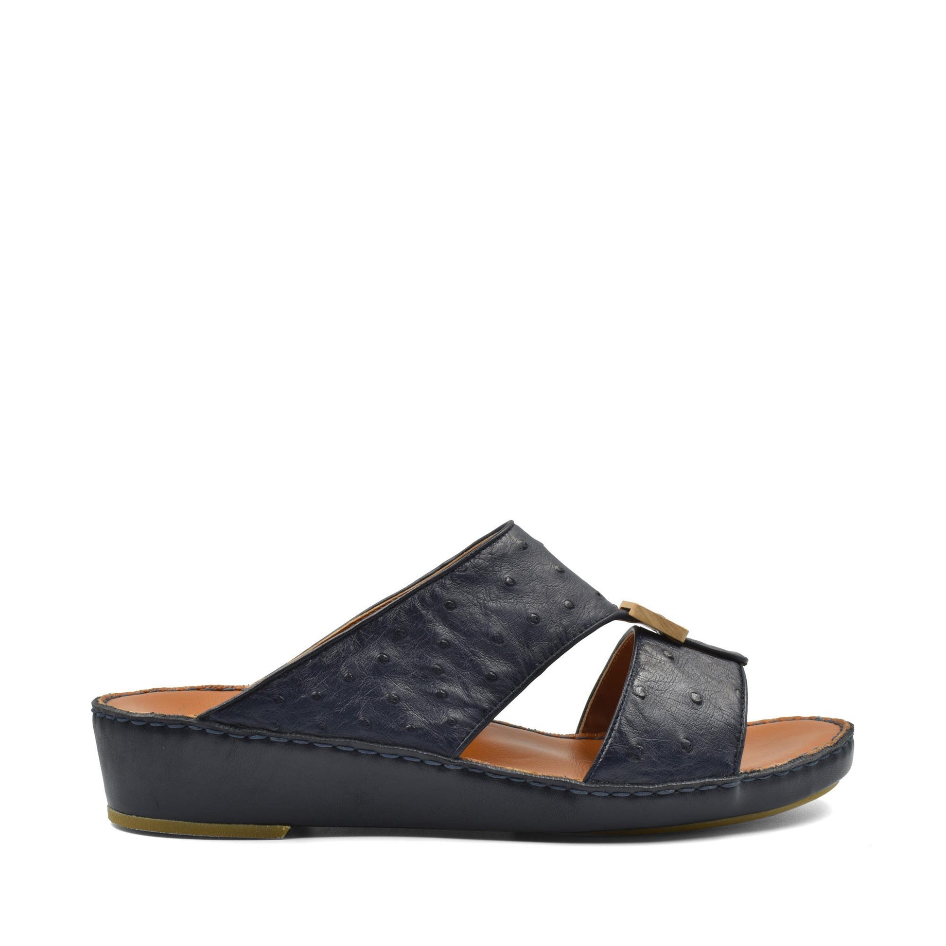 Side view of black handcrafted olive sandals with cushioned sole and open toe design