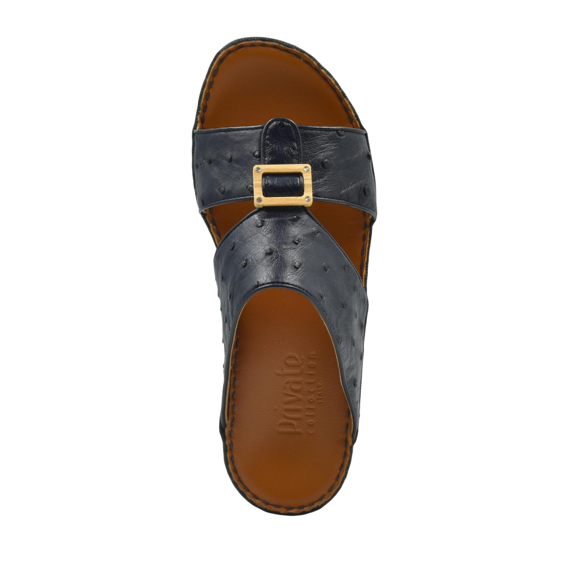Handcrafted olive sandals in black leather with buckle detail and brown cushioned sole