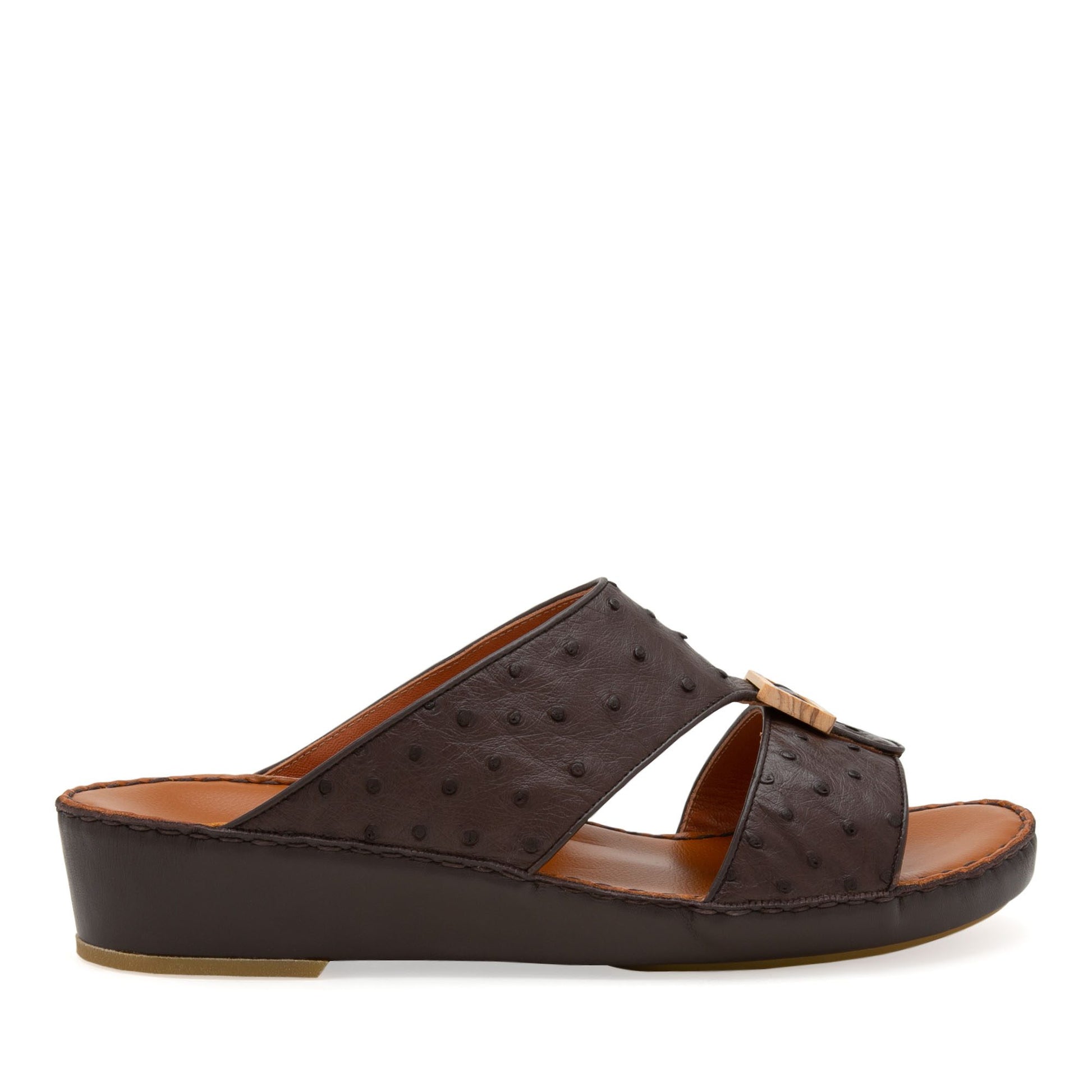 Handcrafted olive sandals with dark brown leather straps and comfortable wedge sole